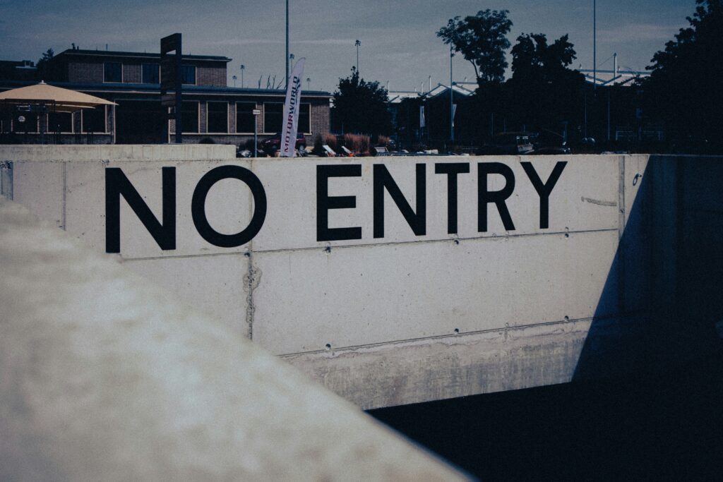 A note on the gate saying "Not Entry"